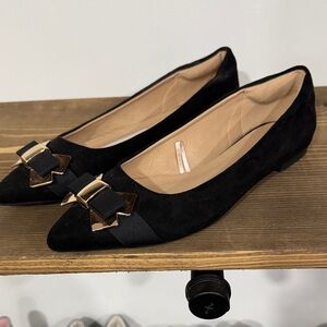 Women's Black Pointed Flats with Gold Bow Accent